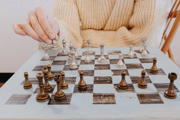 Woman Beige Sweater Sitting Front Chess Board Planning Strategy Hand — Stock Photo, Image
