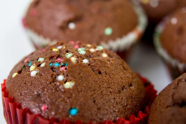 Chokladmuffins med strössel på nära håll — Stockfoto