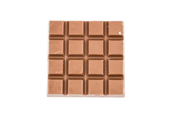 Barra de chocolate lechoso aislado sobre fondo blanco, vista superior — Foto de Stock