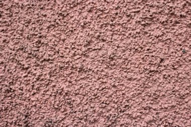 Kirli, pembe, desenli duvar kağıdı.