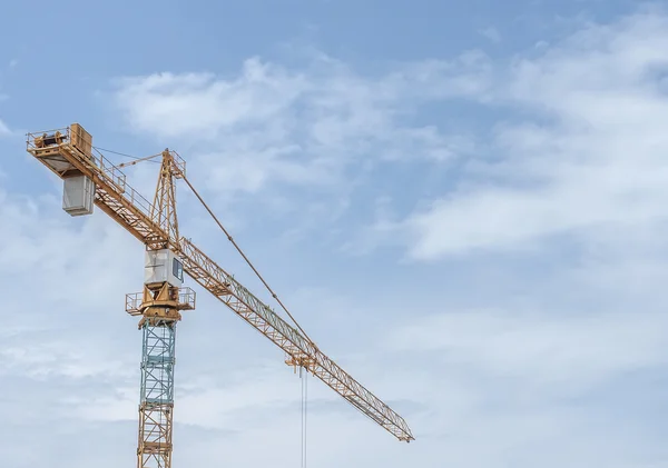 Arrow of the tower crane on the sky background — Stock Photo, Image