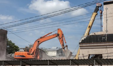 reconstruction of a city street. the demolition of the old build