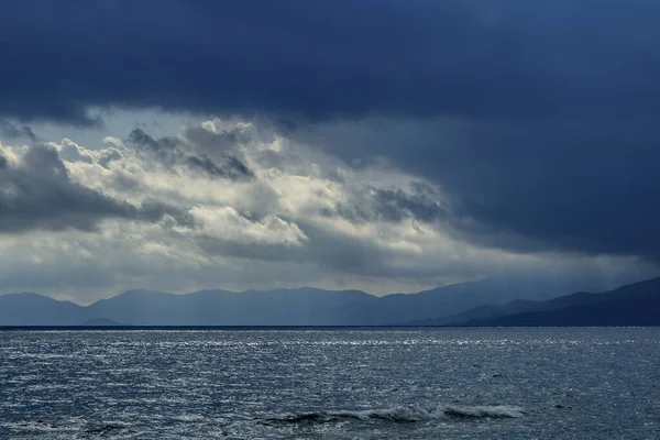Dark blue sky in storm at the sea in Asprovalta, Greece