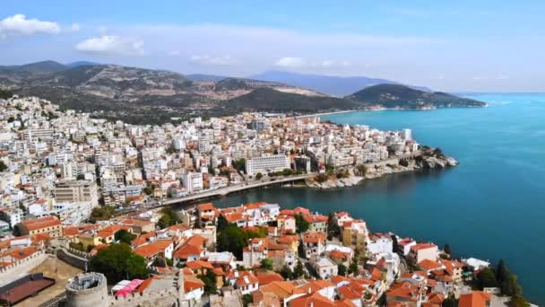 Aerial view of Kavala, a lot of buildings, Aegean sea coast, sea port, ancient fort, green hills in the distance, Greece — Stock Video