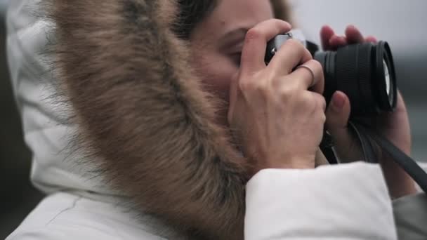 Woman White Winter Coat Taking Photos Shooting Video Vintage Camera — Stock Video