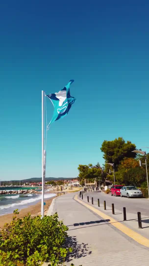 Nikiti Greece October 2020 Blue Flag Sign Embankment Street Greenery — Stock Video