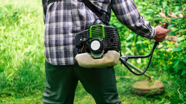 Man Working Hand Held Lawn Mower Garden — Stock Photo, Image