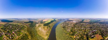 Aerial drone panorama view of nature in Moldova. Villages, valley with river, wide fields clipart