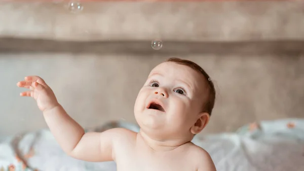 Caucasian Blonde Baby Boy Bed Playing Soap Bubbles Flying — Stock Photo, Image