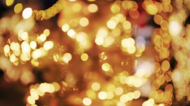 Çerçeveyi dolduran soyut altın bokeh ışıkları