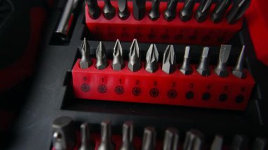Close up shot of a professional tool kit with screwdriver bits and sockets neatly organized