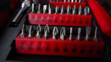 Close up shot of a professional tool kit with screwdriver bits and sockets neatly organized