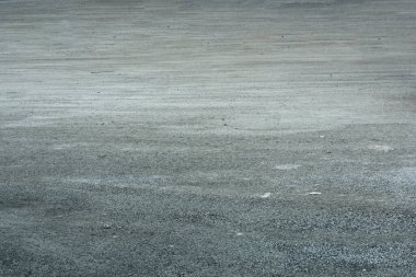 Pek çok küçük taşın zemin taşı gri arka planı. Büyük kaldırımlar, yerde kaldırım taşları. Doku arkaplanı veya arkaplan.