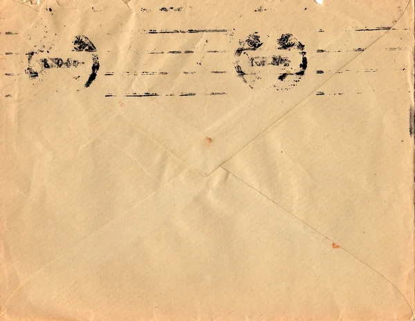 Parte de trás de um velho envelope usado. Mancha rica e detalhes de papel. Pode ser usado como fundo . — Fotografia de Stock