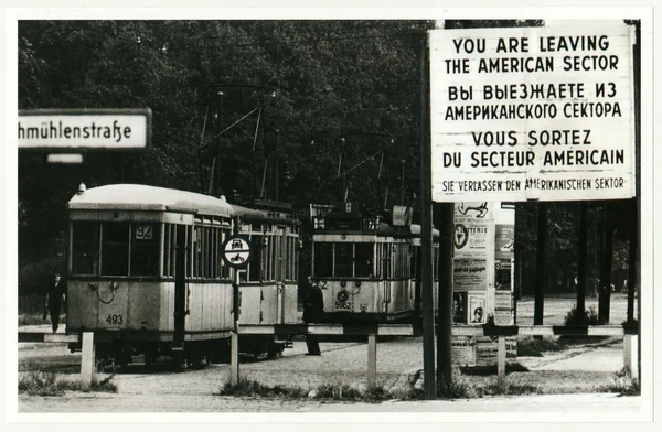 Vintage photo shows checkpoint between west (American sector) and ost Berlin. Tram leaves American sector. — Stock Photo, Image