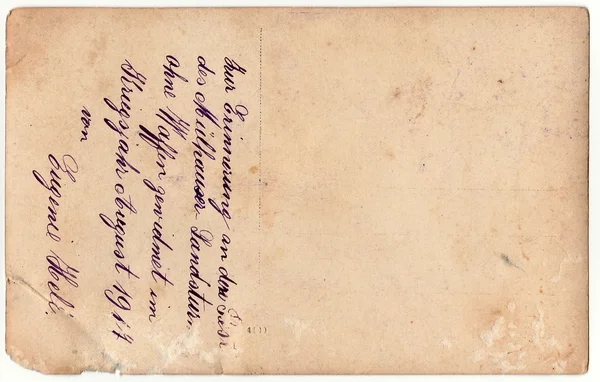Back of a vintage photo - used postcard. Rich stain and paper details. Can be used as background. Image contains handwriting. — Stock Photo, Image