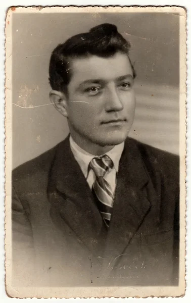 The vintage photo shows young man. The studio photography was taken for A level (GCSE exam) occasion. — Stock Photo, Image