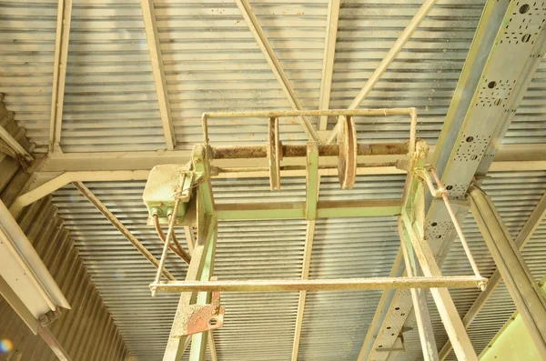 Corn silo (interior). Closeup of a special machine. Old factory.