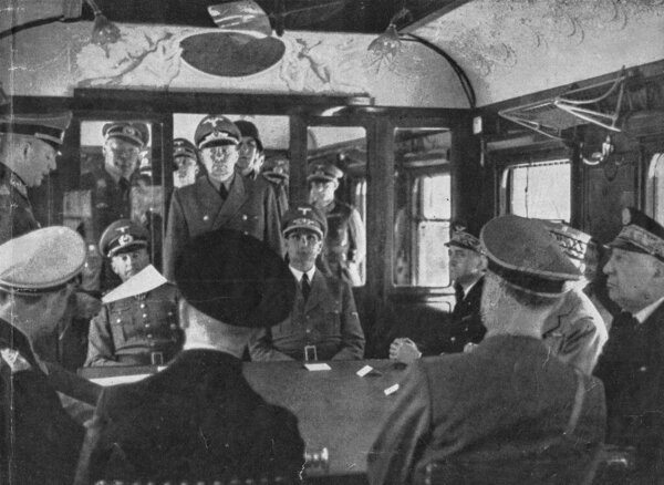 COMPI GNE, FRANCE - JUN 21, 1940: Armistice with France (Second Compiegne) was signed between Nazi Germany and the defeated France in Le Francport, near Compiegne, in the same place as in 1918, in the same railroad carriage, but with the seats swappe