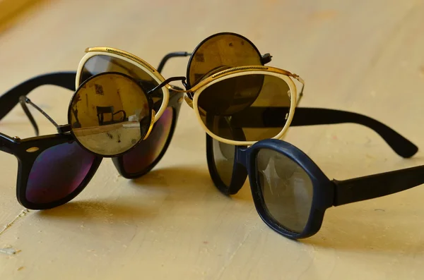 A pile of vintage sunglasses on white background — Stock Photo, Image