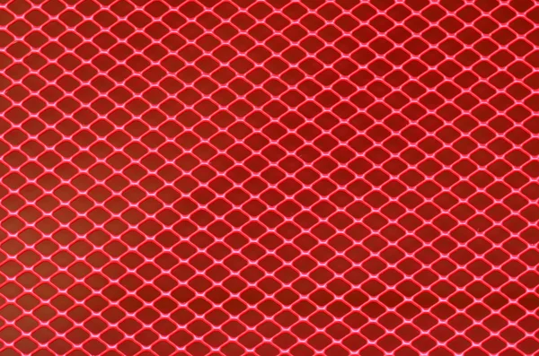 Background of red steel grating — Stock Photo, Image
