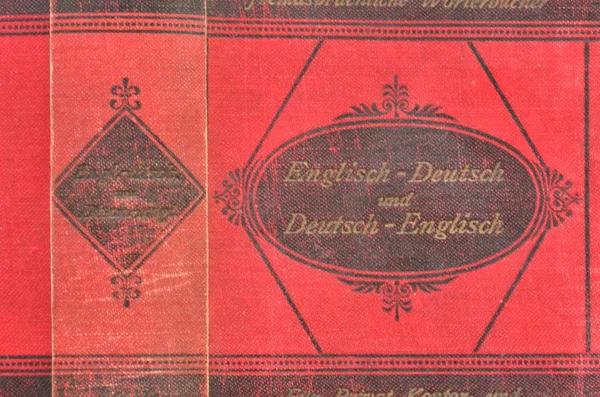 Old English - German dictionary. Back of vintage book. Fine-grained motive with red and black texture — Stock Photo, Image