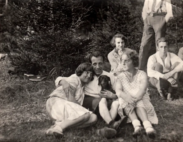 A young boy with girls. Vintage photo.  Early forties — 스톡 사진