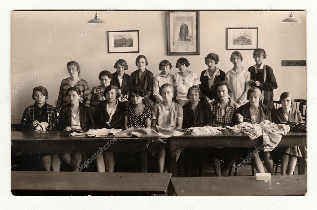 A group of girls in classroom (1933). Vintage photo.