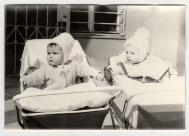Vintage photo shows babies in prams (baby carrieges), circa 1972. clipart