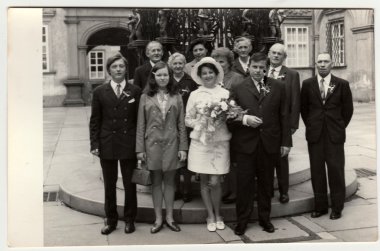 A vintage photo shows wedding photo, circa 1970.