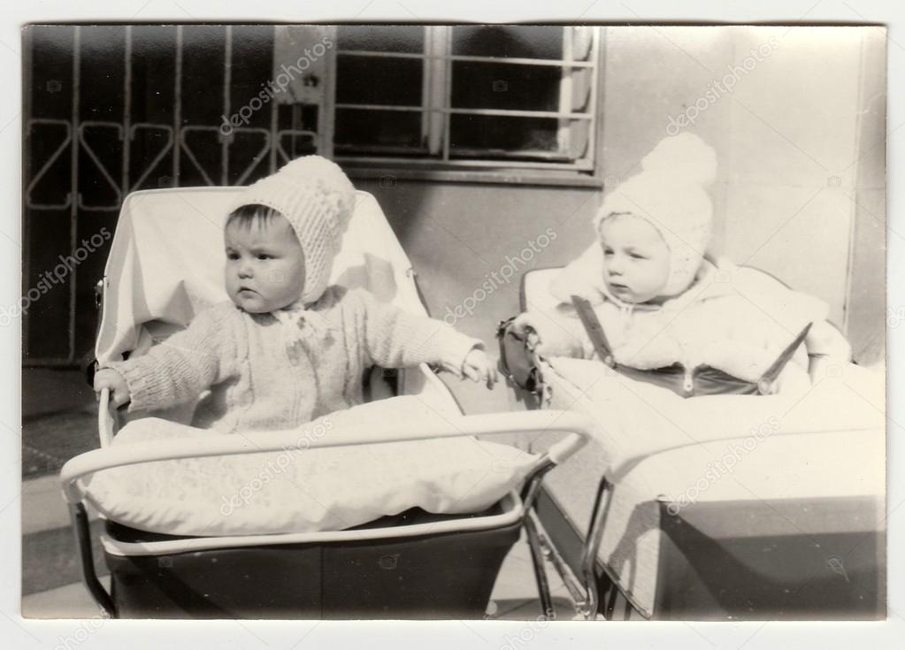Vintage photo shows babies in prams (baby carrieges), circa 1972.
