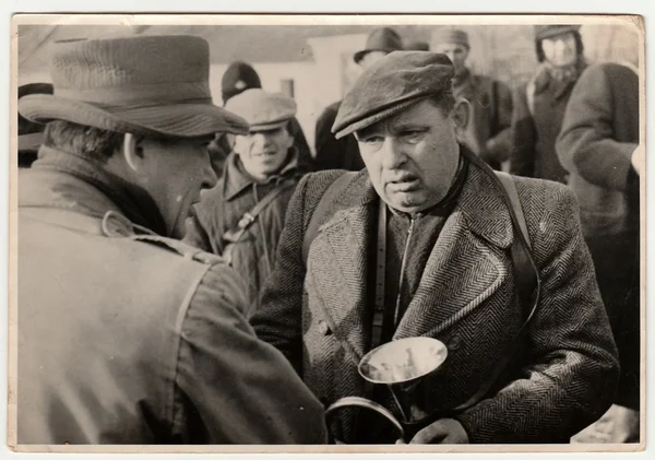 Vintage photo shows men after hunting, circa 1960s. — Stock Fotó