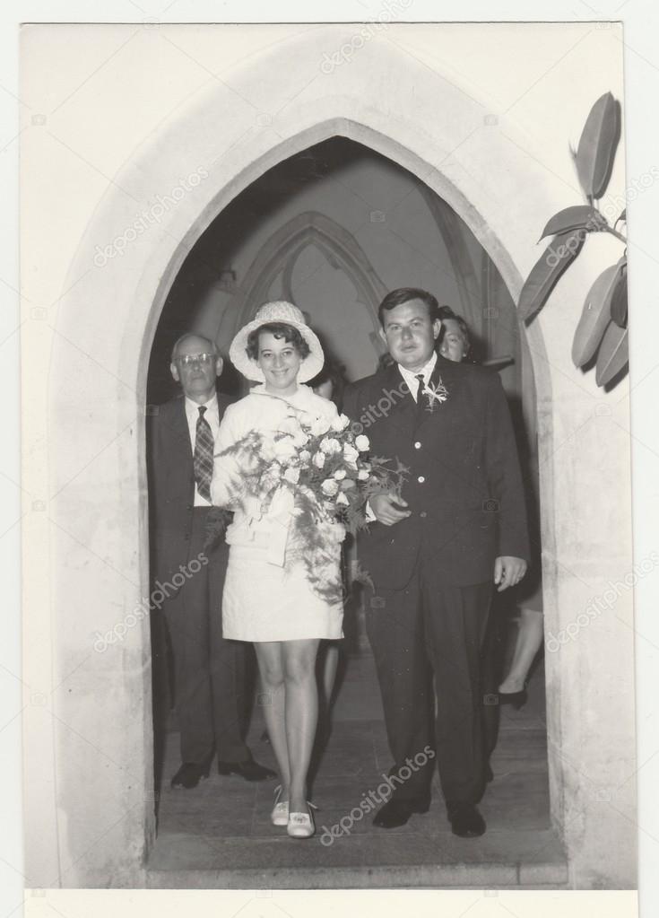 A vintage photo shows wedding photo, circa 1970.