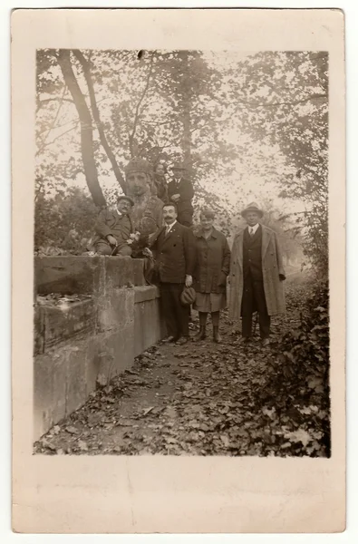 Vintage photo shows people in the city park. — Stock Photo, Image