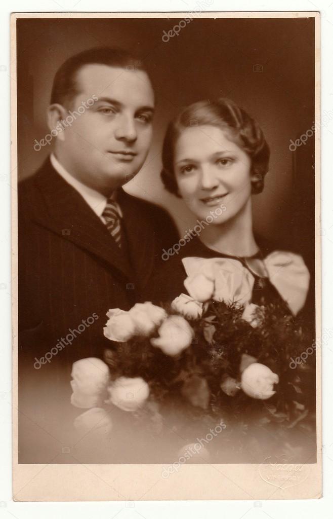 Vintage photo shows marrital couple.