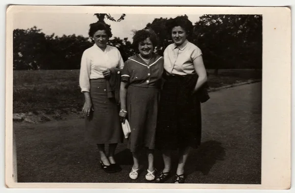 Vintage photo shows women outdoors. — Stock Photo, Image
