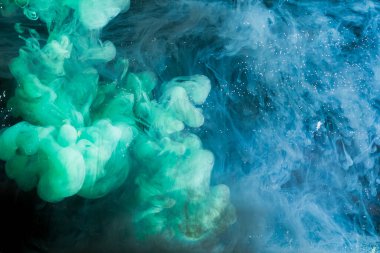 Hareket Rengi suya düşer, mürekkep kıvrılır, mürekkep soyutlanır. Suyun altında süslü bir mürekkep bulutu.