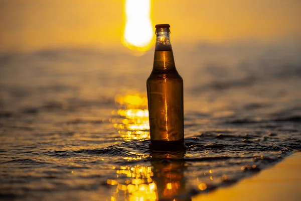 Beer Bottle Sunset Sea Water Bokeh Background — Stock Photo, Image