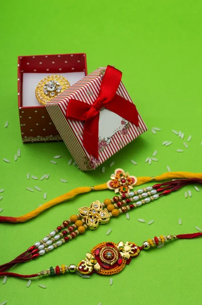 Indian festival: Raksha Bandhan background with Rakhi and Gift — Stock Photo, Image