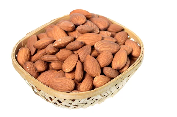 Almonds in a wooden (Bamboo) basket — Stock Photo, Image