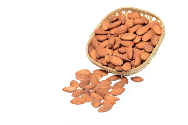 Almonds in a wooden (Bamboo) basket — Stock Photo, Image