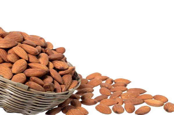 Almonds in basket isolated on white — Stock Photo, Image