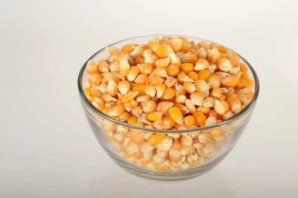 Dried corn in bowl — Stock Photo, Image