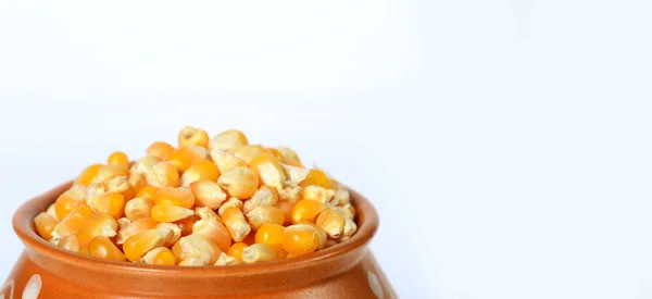 Dried corn in clay pot — Stock Photo, Image