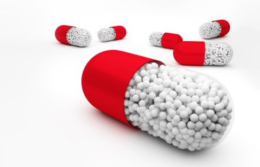 Beyaz arka plan üzerinde çift renkli kapsül