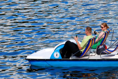 An Unidentified People on Boat on River