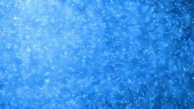 Kış Blizzard, mavi sıvı akan küçük parçacıklar