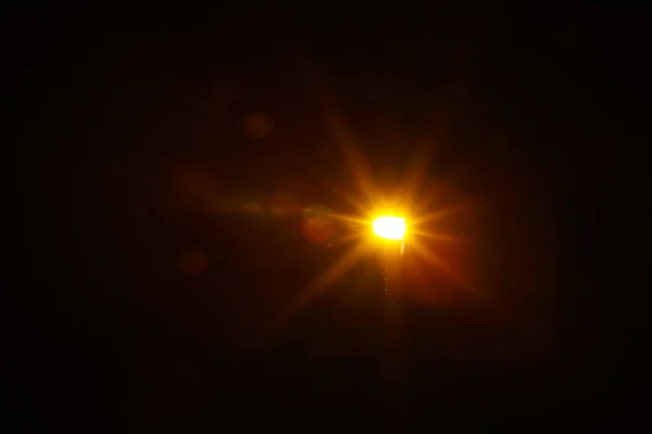 Abstract Natural Sun flare на чорному тлі. — стокове фото