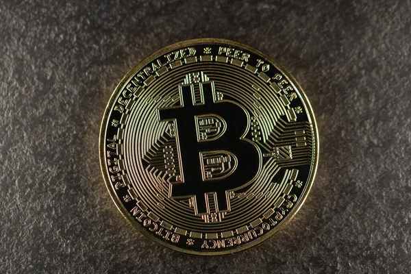 Bitcoin gold coin on metal surface. Symbol of Cryptocurrency. Bit coin digital currency. Online finance
