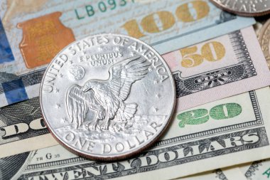 Eisenhower Dollar on USD Banknotes. Twenty, Fifty and one hundred Dollar Bills. United States of America Currency. Federal Reserve Banknotes